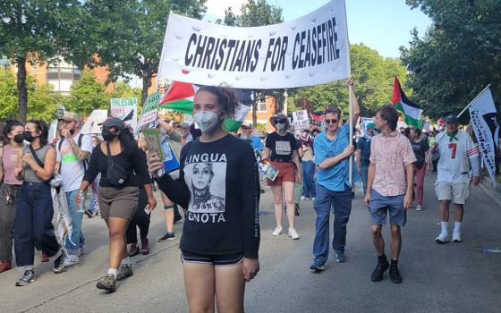 Thousands of protesters participate in the "March on the DNC" on the opening day of the Democratic National Convention, Aug. 19 in Chicago. (NCR photo/Heidi Schlumpf)