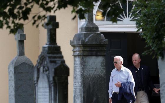 Biden leaves church.