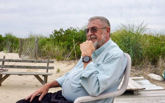 Fr. Ed Reading on a day off at his house on the Jersey Shore in July (Camillo Barone)