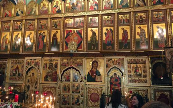 Large, ornate, rood-screen covered in icons. 