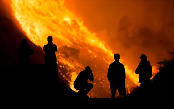 People in Yorba Linda, California, are seen near the Blue Ridge Fire Oct. 26, 2020. (CNS/Reuters/Ringo Chiu)