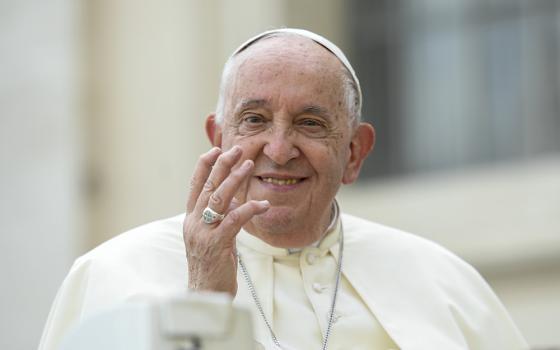 Pope Francis waves to visitors from the popemobile before his weekly general audience in St. Peter's Square at the Vatican Oct. 9, 2024. (CNS/Vatican Media)