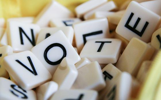 Jumbled letters spelling VOTE (Unsplash/Glen Carrie)