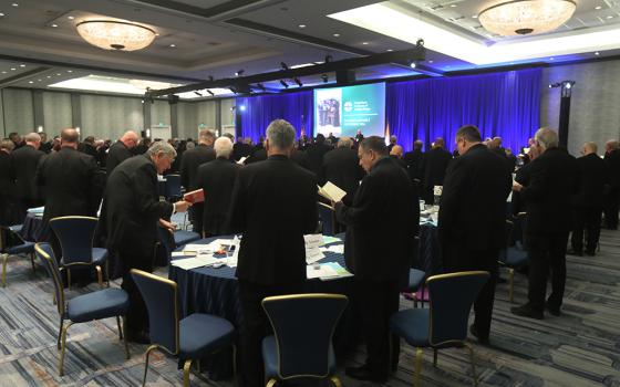 Prelates pray during a Nov. 12 session of the fall general assembly of the U.S. Conference of Catholic Bishops in Baltimore. (OSV News/Bob Roller)