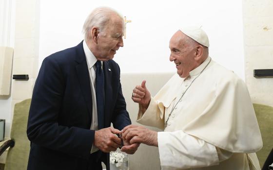   Pope Francis gives U.S. President Joe Biden a thumbs up during a private meeting on the margins of the Group of Seven summit in Borgo Egnazia, in Italy's southern Puglia region, June 14, 2024. (CNS photo/Vatican Media)