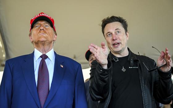 President-elect Donald Trump listens to Elon Musk as he arrives to watch SpaceX's mega rocket Starship lift off for a test flight from Starbase in Boca Chica, Texas, Nov. 19, 2024. (Brandon Bell/Pool via AP, File)