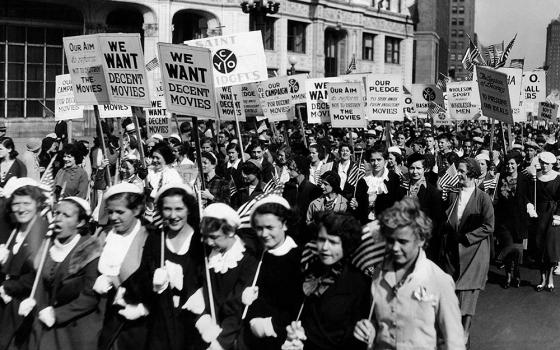 Some 50,000 members of the National Legion of Decency, including parochial school students, parade down Michigan Avenue in Chicago on Sept. 27, 1934, to demand "decent movies." (Shutterstock/Everett Collection)