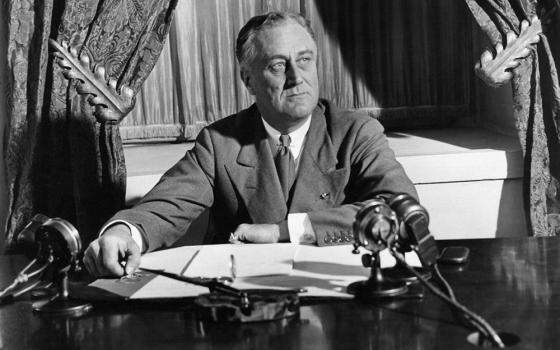 President Franklin D. Roosevelt broadcast his first fireside chat in 1933 regarding the banking crisis from the White House, Washington, D.C. (Wikimedia Commons/National Archives and Records Administration)