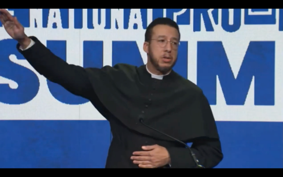 This is a screenshot from video of Anglican Fr. Calvin Robinson, who closed his remarks Jan. 25 at the National Pro-Life Summit in Washington, D.C., with a movement that appeared to be a Nazi gesture. Robinson later posted video of the gesture on X. (NCR screenshot/X/@calvinrobinson)