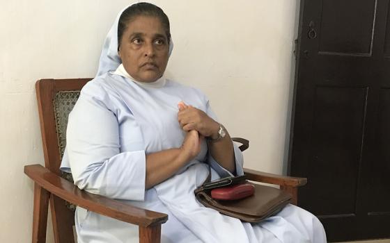 Salvatorian Sr. Princy Fernandopulle at her office at Children of Joy Child Development Center in Wattala, near Colombo, Sri Lanka. She explains the challenges in deinstitutionalizing child care and the steps taken by five women's congregations. (Thomas Scaria)