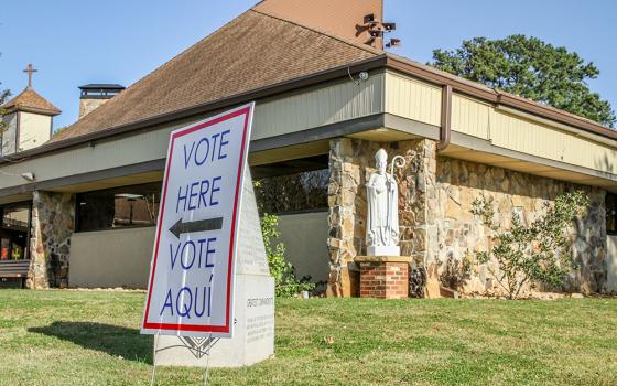 A bilingual voting sign is seen at St. Patrick Church polling station in Norcross, Ga., on Election Day 2020. (OSV News/The Georgia Bulletin/Michael Alexander)