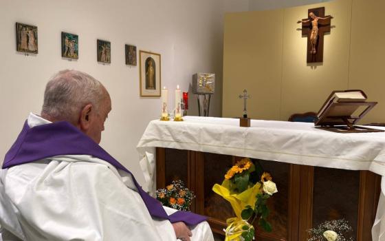 Pope Francis is seen in the chapel of his suite of rooms at Rome's Gemelli hospital March 16, 2025. The Vatican press office said the 88-year-old pope concelebrated Mass that morning. (CNS photo/Vatican Press Office