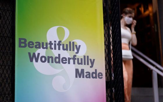 A banner hangs outside St. Francis of Assisi Church in New York City following an annual "Pre-Pride Festive Mass" June 26, 2021. The liturgy, hosted by the parish's LGBT Ministry, is traditionally celebrated on the eve of the city's Pride march.