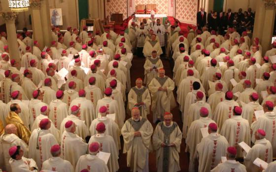 Bishops and altar servers process out after Mass at St. Peter Claver Church in Baltimore last year during the annual fall general assembly of the U.S. Catholic Bishops. (CNS/Bob Roller)