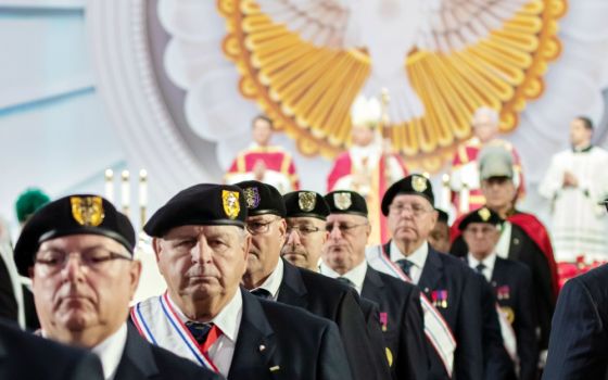 Members of the Knights of Columbus are seen during the closing procession of the 136th Supreme Convention's opening Mass Aug. 7, 2018, at the Baltimore Convention Center. (CNS/Catholic Review/Kevin J. Parks)