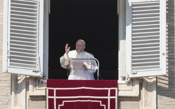 Pope Francis delivers the Angelus noon prayer from his studio window overlooking St. Peter's Square at the Vatican, Sunday, Feb. 6, 2022. (AP Photo/Gregorio Borgia)