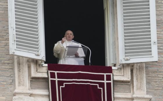 Pope Francis delivers the Angelus noon prayer from his studio window overlooking St. Peter's Square, at the Vatican, Sunday, Feb. 20, 2022. (AP Photo/Gregorio Borgia)