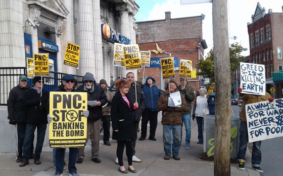 Protesters in Pittsburgh demonstrate against PNC Bank's connection to firms involved in nuclear weapons production. (Paul Dordal)