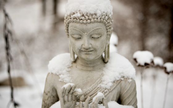 Buddha in snow (Unsplash/Jamie Templeton)