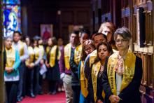 Lay students receiving a pastoral theology certificate in Spanish line up before Mass and a graduation ceremony in January 2016 at Holy Spirit Church in Atlanta. (CNS/Georgia Bulletin/Thomas Spink)