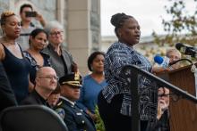 Rebecca Kitana, a parishioner at St. Matthew Church in Northwood, Maryland, talks during an Oct. 10 announcement at Sacred Heart of Jesus-Sagrado Corazon de Jesus in Baltimore about an ID card program for immigrants. (CNS/Catholic Review/Kevin J. Parks)