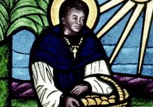 St. Martin de Porres is depicted in a stained glass window at Holy Rosary Church in Minneapolis.