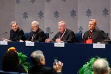 Members of the General Secretariat of the Synod, from left, Msgr. Riccardo Battocchio and Jesuit Fr. Giacomo Costa, both special secretaries for the synodal assembly; Cardinal Jean-Claude Hollerich, relator general of the synod; and Cardinal Mario Grech, secretary-general of the synod, attend a news conference at the Vatican Oct. 26. (CNS/Lola Gomez)