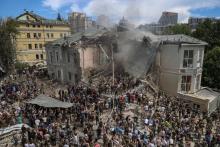 Rescuers work at Okhmatdyt Children's Hospital in Kyiv, Ukraine's capital, July 8, after it was severely damaged during Russian missile strikes. At least 31 were killed and over 135 injured as Russian bombers pummeled Kyiv and other Ukrainian cities that day with more than 40 missiles and guided aerial bombs. (OSV News/Reuters/Oleksandr Ratushniakters)