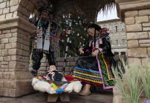 A Nativity display is pictured as Pope Francis recites the Angelus prayer on the feast of the Holy Family, Dec. 26, 2021, in St. Peter's Square at the Vatican. The pope said as a "Christmas gift" he had written a letter to families. (CNS/Vatican Media)