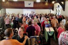 Parishioners of St. William Catholic Community in Louisville, Kentucky, share the sign of peace at a recent Mass. (Courtesy of St. William Catholic Community)